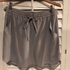 Acrobat 100 0/0 silk grey mini skirt.